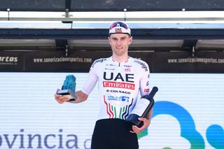 CONDADO DE TREVIO SPAIN AUGUST 09 Finn FisherBlack of New Zealand and UAE Team Emirates on third place poses on the podium ceremony after the 46th Vuelta a Burgos Stage 5 a 156km stage from Frias to Condado de Trevio on August 09 2024 in Condado de Trevio Spain Photo by Gonzalo Arroyo MorenoGetty Images