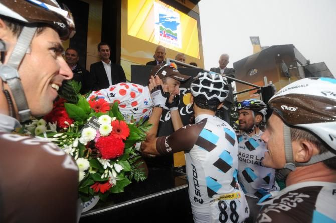 Blel Kadri's Ag2r-La Mondiale teammates congratulates him on the stage win