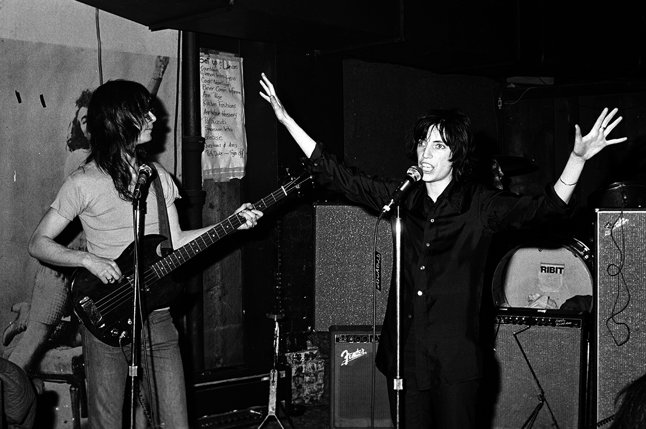 Patti Smith performing with Lenny Kaye (left) from the Patti Smith Group at CBGB's club in New York City on April 04 1975