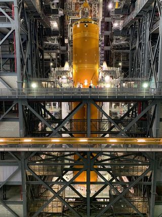 The Space Launch System core booster was stacked on top of its mobile launch platform on June 13, ahead of an estimated November launch.