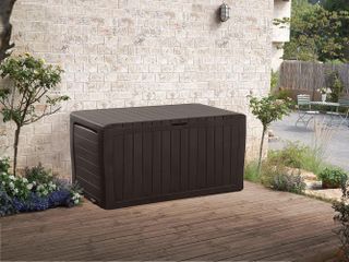 dark wood-look storage box in an outdoor space