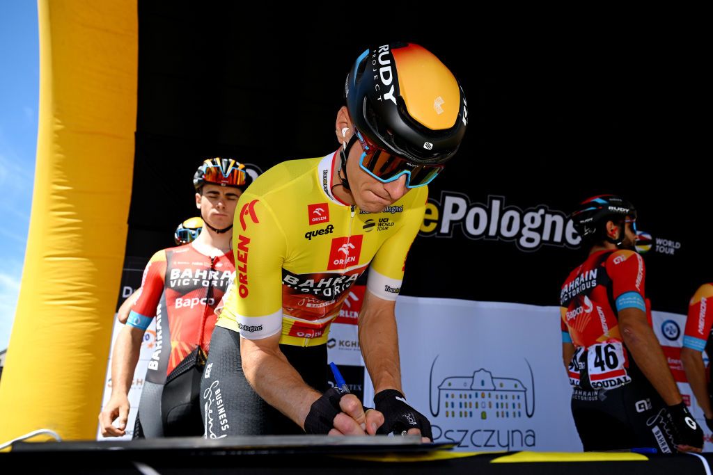 PSZCZYNA POLAND AUGUST 02 Matej Mohoric of Slovenia and Team Bahrain Victorious Yellow leader jersey signing prior to the 80th Tour de Pologne 2023 Stage 5 a 1988km stage from Pszczyna to BielskoBiala 430m UCIWT on August 02 2023 in Pszczyna Poland Photo by Dario BelingheriGetty Images