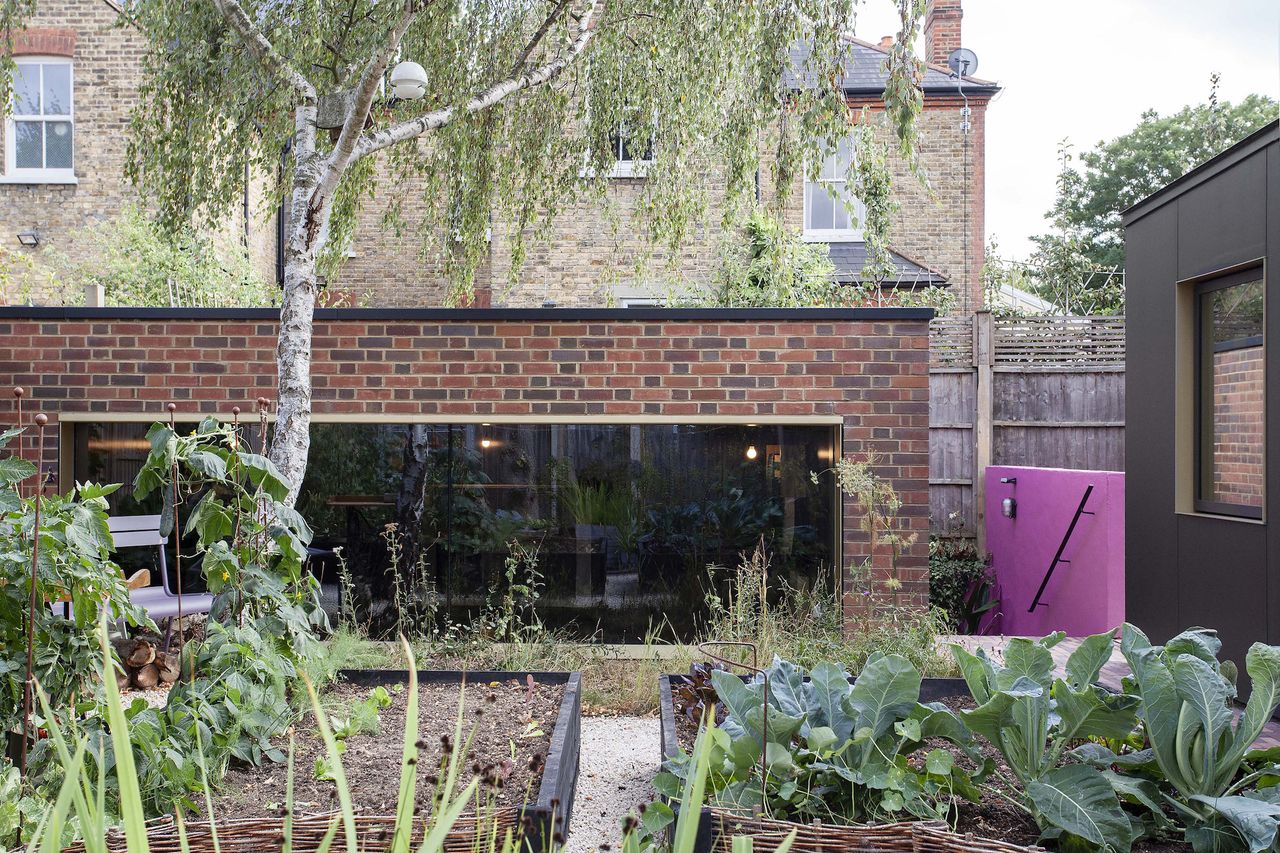 brick garden room studio with large window