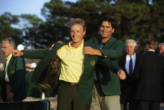 Bernhard Langer puts on the Green Jacket during the Masters presentation in 1993