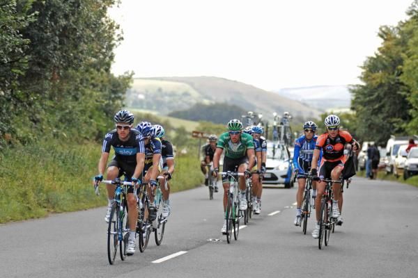The day's main break approaches the feed zone.
