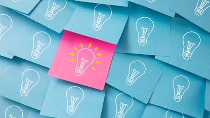 post it notes with light bulb, concept for bright idea