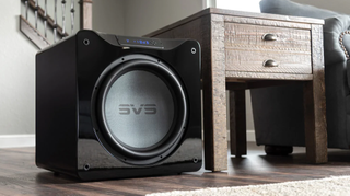 SVS 4000 series subwoofer next to side table in living room
