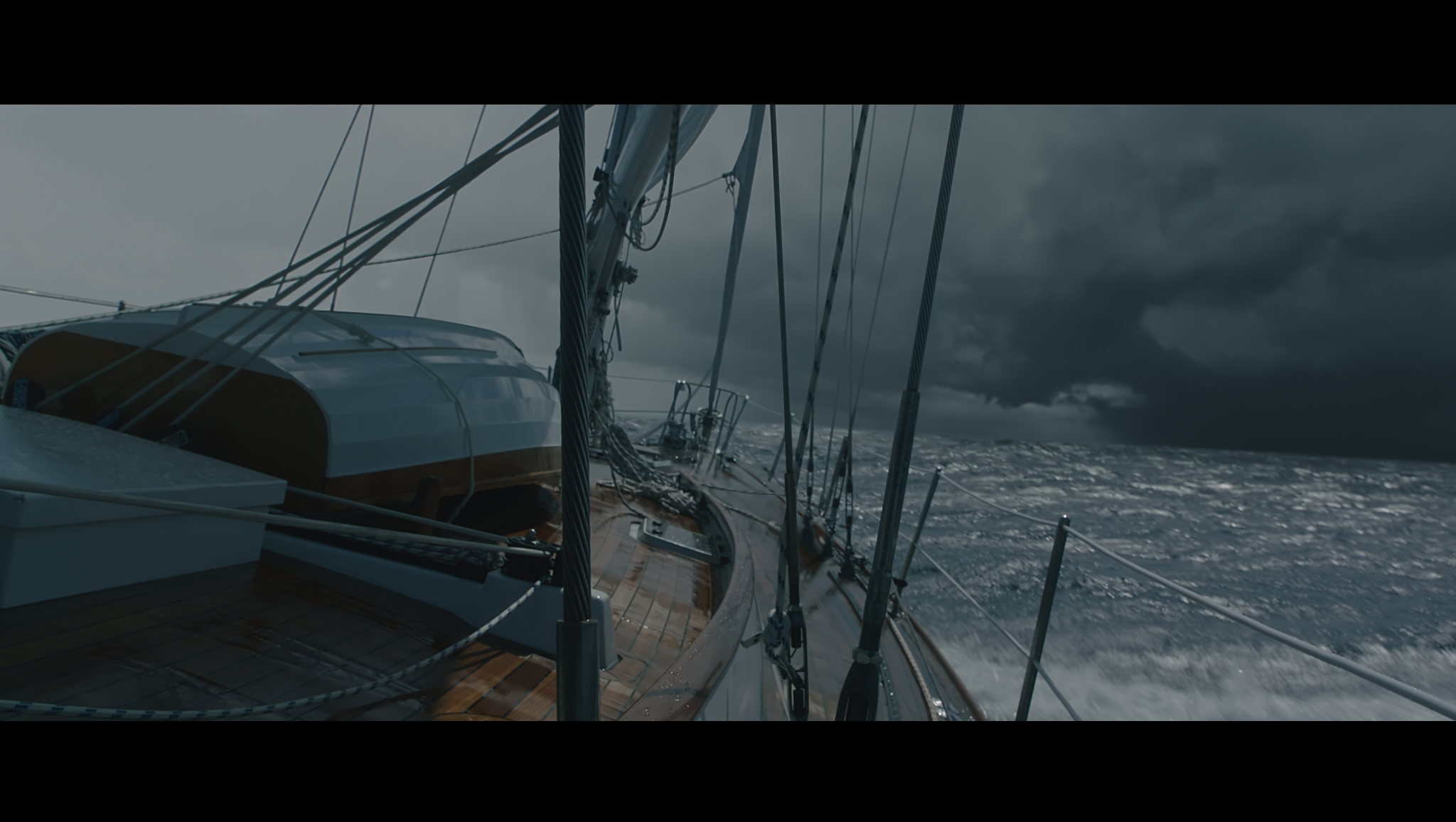 A boat cutting its way through choppy waters