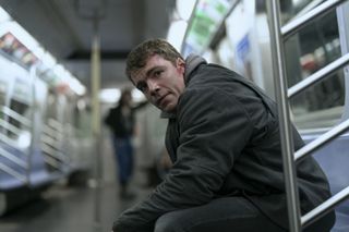 Peter escapes onto the subway in The Night Agent season 2