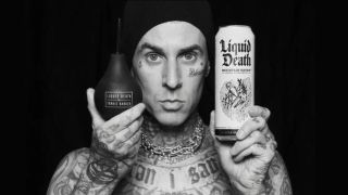 Travis Barker with Liquid Death signature enema kit 