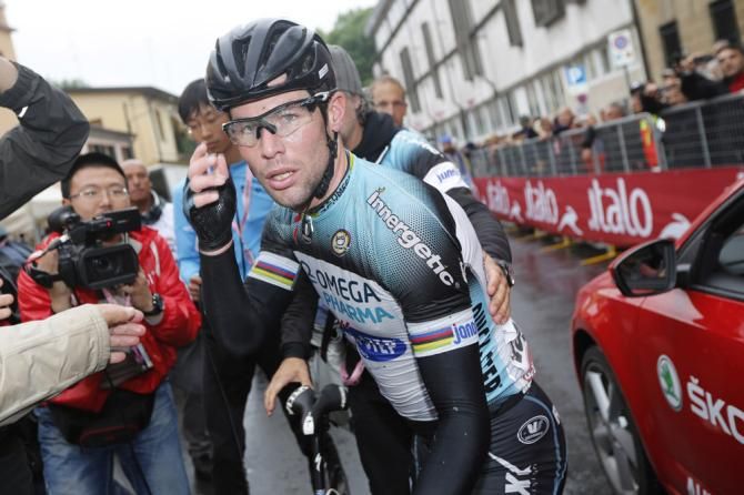 Stage 12 winner Mark Cavendish in the media scrum post-race.