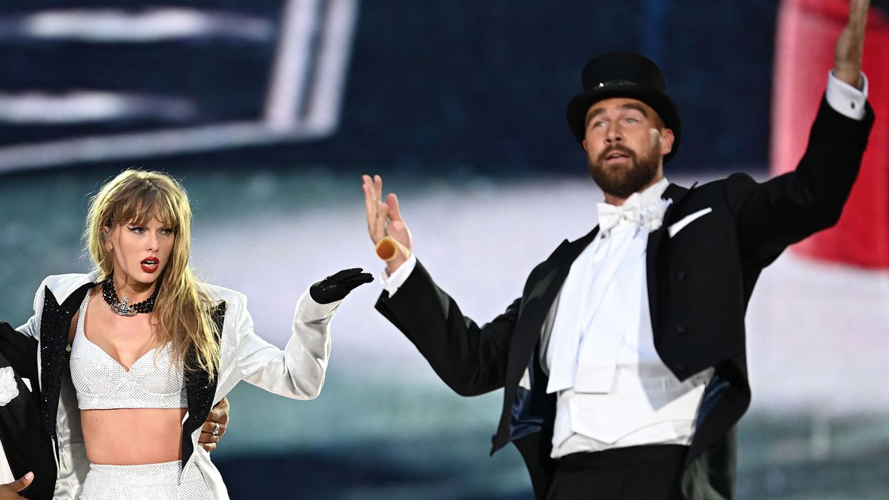 Taylor Swift and Travis Kelce on stage together during the Eras Tour.