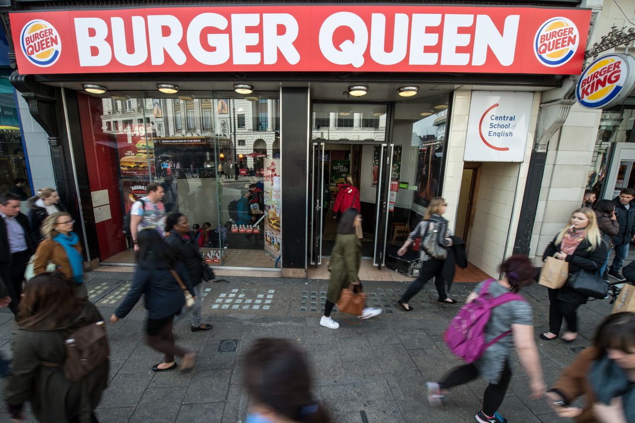 LONDON, ENGLAND - APRIL 21:A Burger King restaurant has changed its name to 'Burger Queen' for the day to mark the 90th birthday of Queen Elizabeth II at Tottenham Court Road on April 21, 201