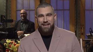 Travis Kelce delivering monologue on Saturday Night Live
