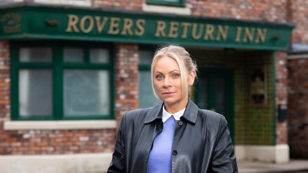 DS Lisa Swain standing outside the Rovers Return Inn in Coronation Street