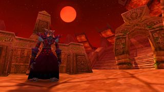 One of WoW Classic's characters stands in front of a huge blood moon