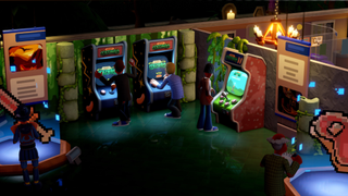 Visitors play on arcade machines in Two Point Museum.