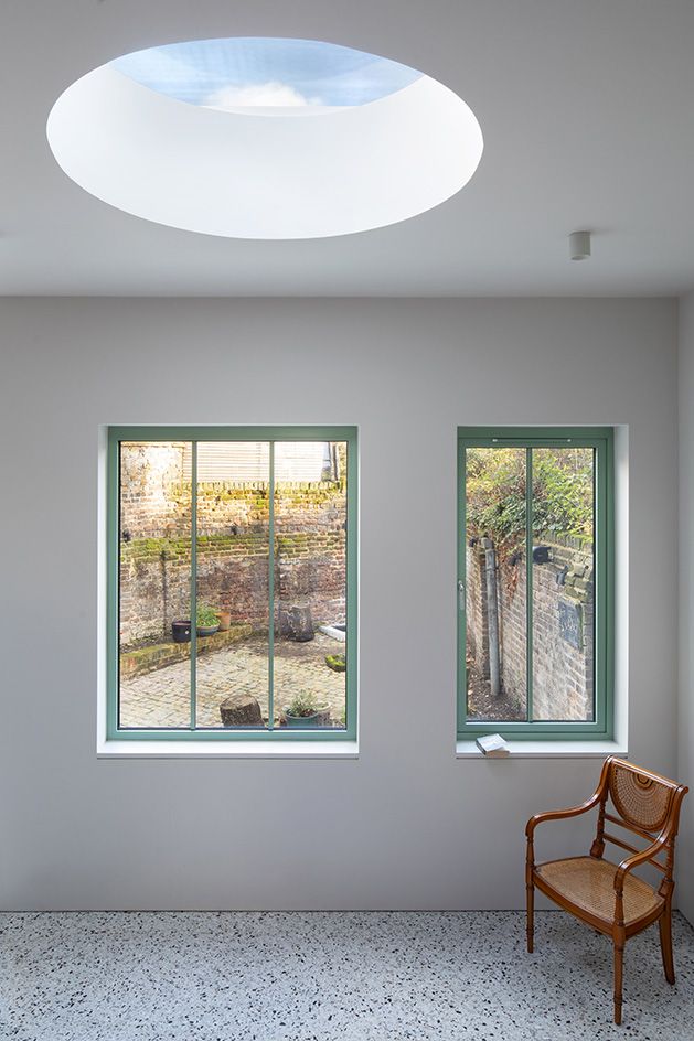 The Saddlery white room with chair looking out