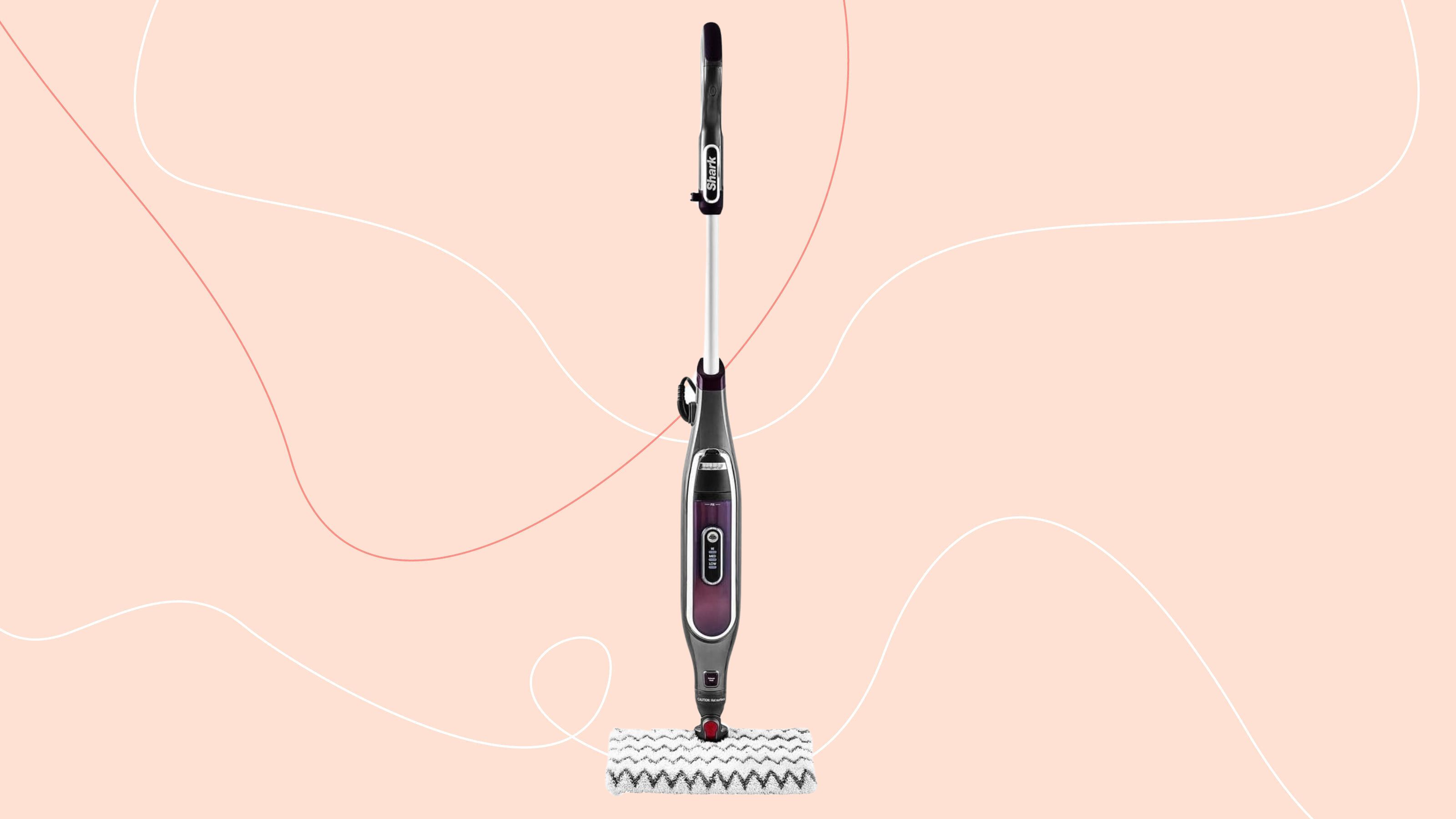 Shark Klik n Flip Automatic Steam Mop on a pink background