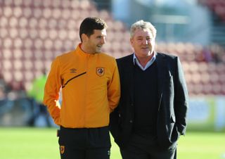 Alex Bruce (left) and father Steve Bruce