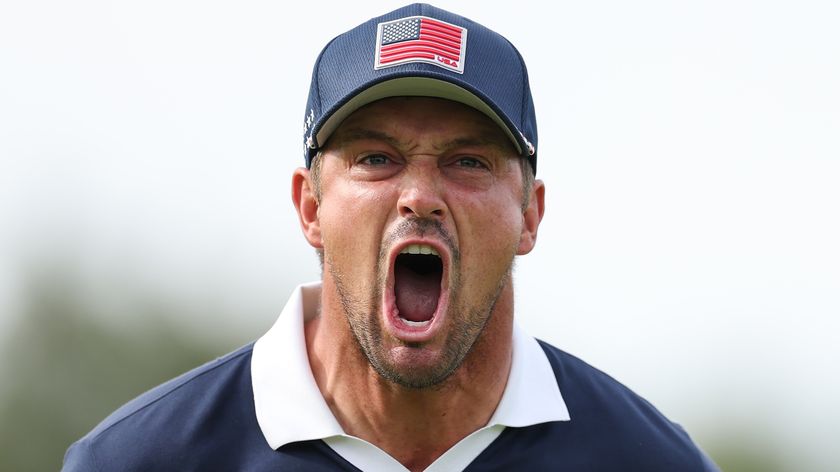 Bryson DeChambeau of Team United States reacts after making his putt to win the 11th hole during the Saturday afternoon four-balls matches of the 2025 Ryder Cup at Black Course at Bethpage State Park Golf Course on September 27, 2025 in Farmingdale, New York. 