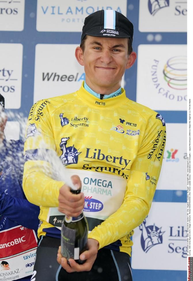 Volta ao Algarve leader Michal Kwiatkowski (Omega Pharma-QuickStep) pops the champagne