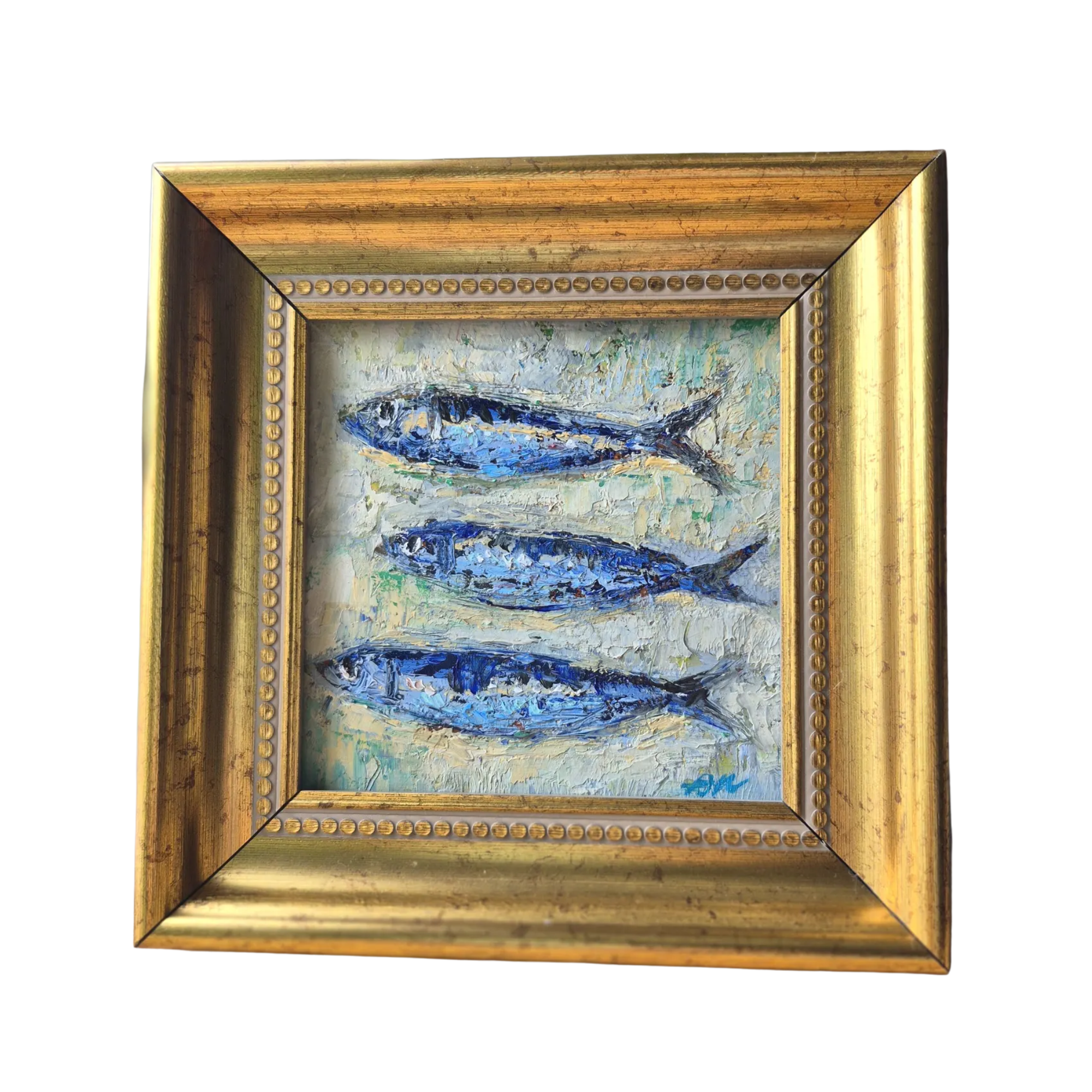 a painting with three fish on it