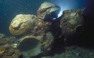 Ceramic bowls underwater at the Java Sea Shipwreck site.