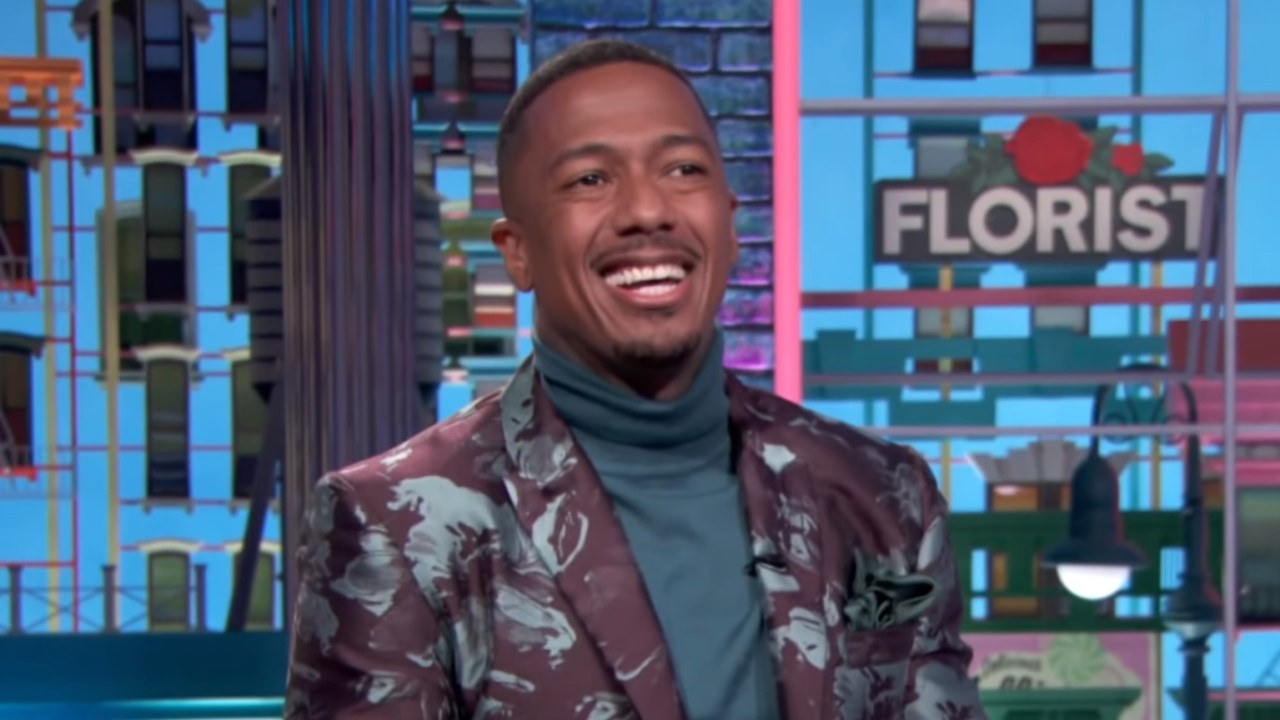 Nick Cannon in colorful jacket on his talk show