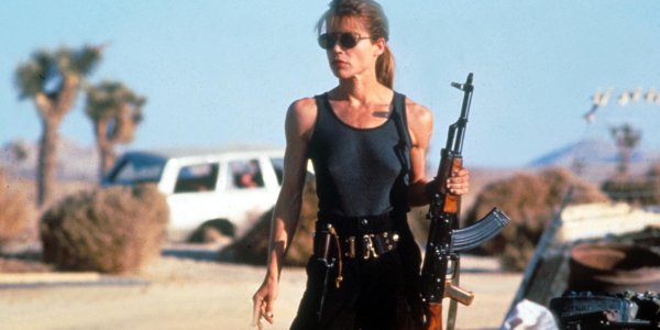 Terminator 2: Judgement Day Sarah Connor holding an automatic rifle in the desert