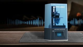 An Anycubic Photon D2 3D Printer sitting on a desk