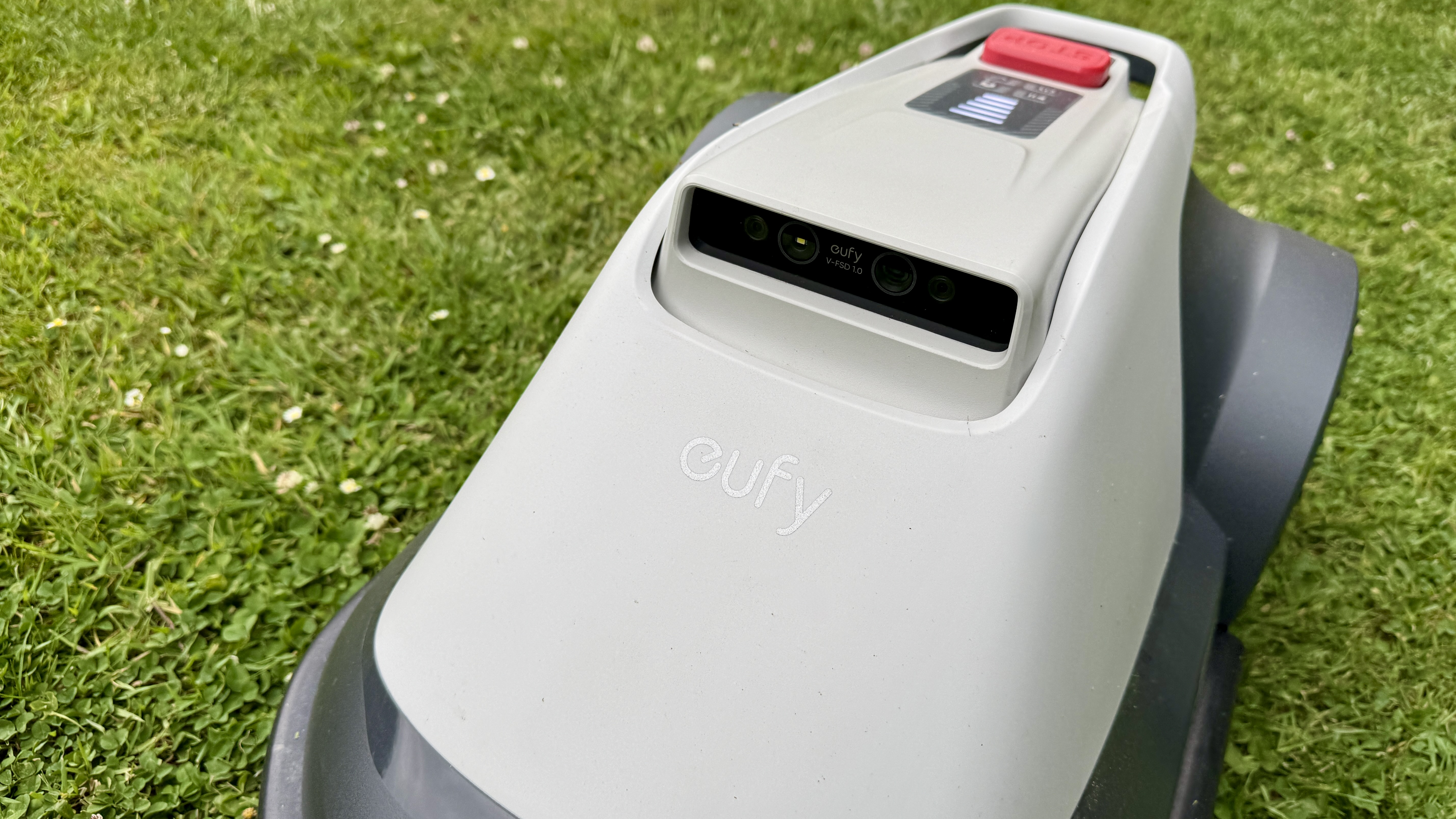 Eufy E15 robot lawn mower on reviewer's lawn
