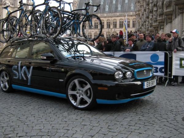 Tam Sky's team car is near the front of the convoy