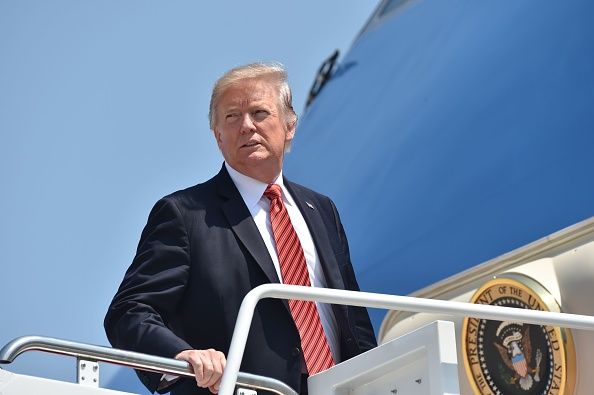 Trump boards Air Force One.