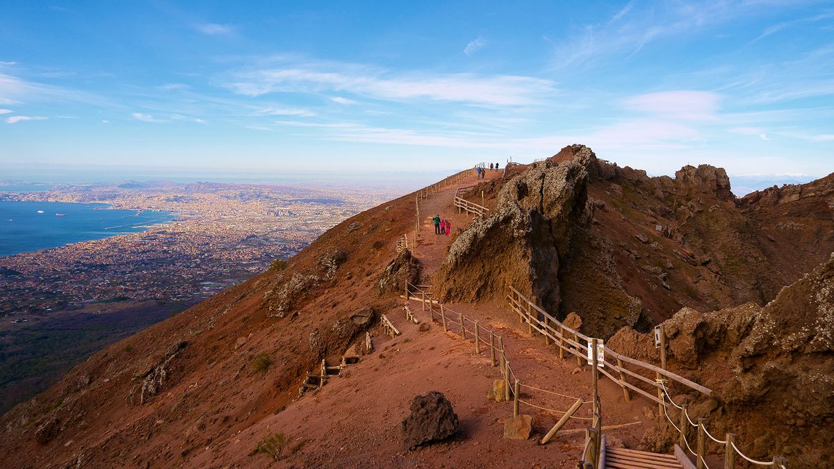 A tourist visiting Mount Vesuvius dropped his phone. Then he fell into the volca..