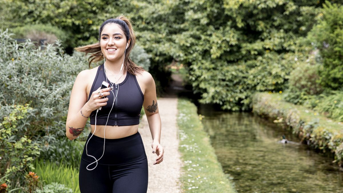 Female runner wearing headphones