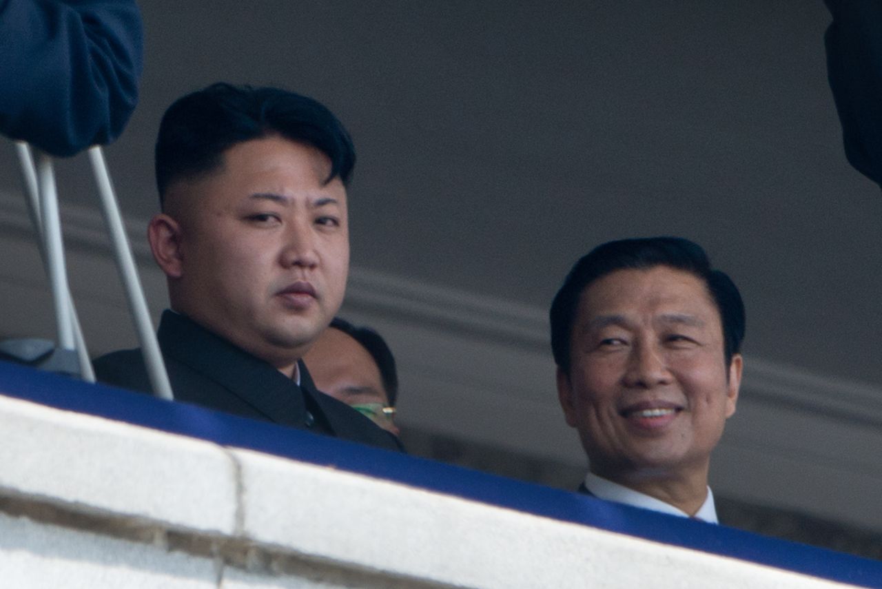 Kim Jong-Un sits with China&amp;#039;s Vice President Li Yuanchao.