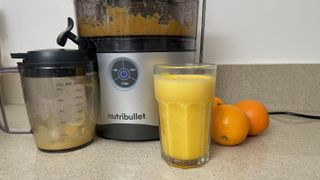 making orange juice with the Nutribullet juicer pro