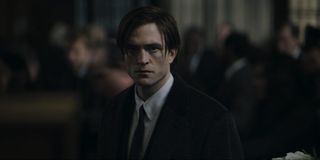 The Batman Robert Pattinson as Bruce Wayne in a black suit