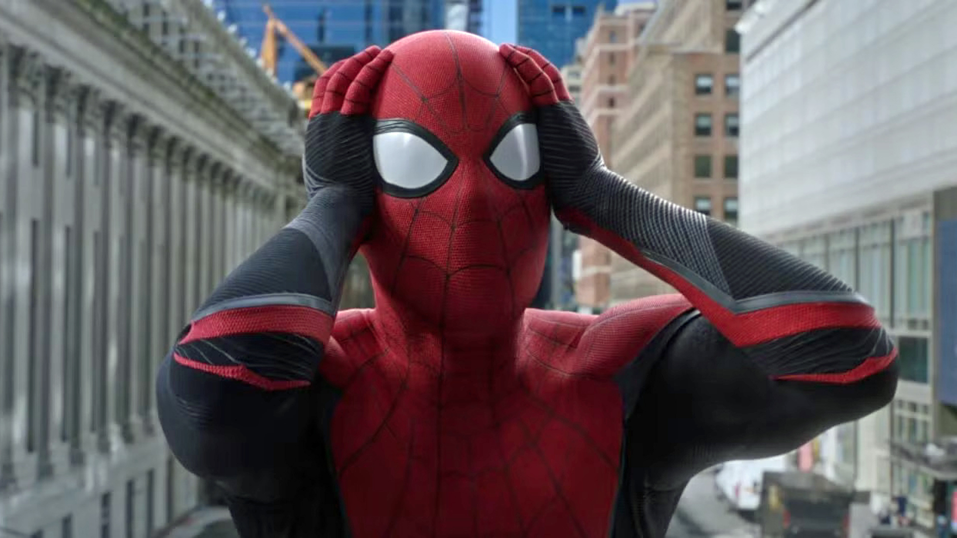 Spider-Man holds his hands to his head in shock in Spider-Man: Far From Home