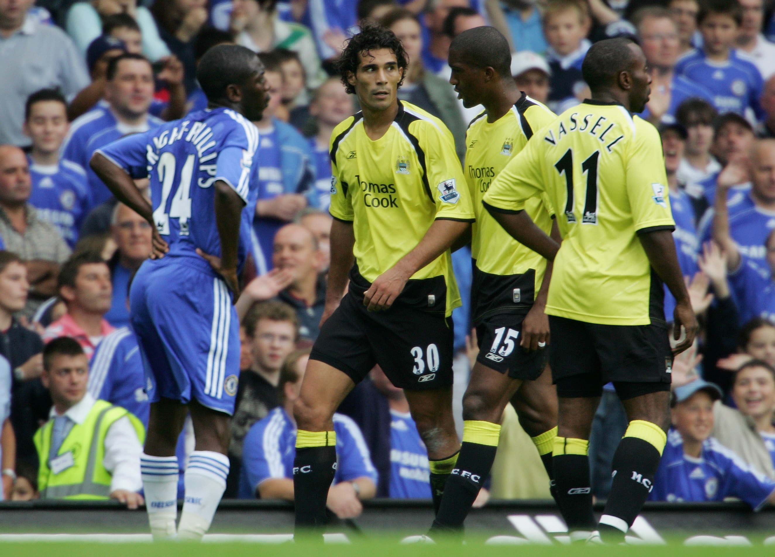 Bernardo Corradi (centre) reacts after his red card for Manchester City against Chelsea in August 2006.