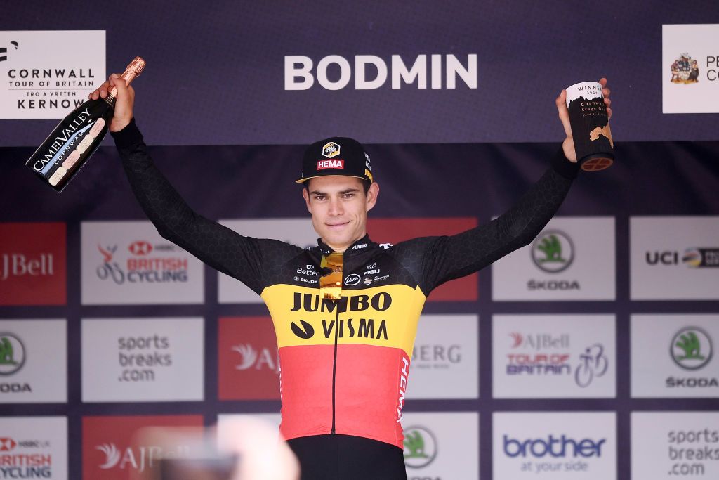 BODMIN ENGLAND SEPTEMBER 05 Wout Van Aert of Belgium and Team Jumbo Visma celebrates winning the stage on the podium ceremony after the 17th Tour of Britain 2021 Stage 1 a 1808km stage from Penzance to Bodmin TourofBritain TourofBritain on September 05 2021 in Bodmin England Photo by Harry TrumpGetty Images