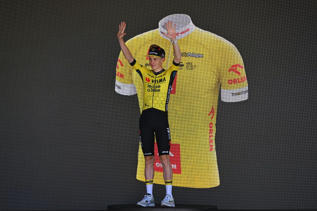 KARPACZ POLAND AUGUST 13 Jonas Vingegaard Hansen of Denmark and Team Team Visma Lease a Bike celebrates at podium as Yellow leader jersey winner during the 81st Tour de Pologne Stage 2 a 154km individual time trial stage from Mysakowice to Karpacz UCIWT on August 13 2024 in Karpacz Poland Photo by Luc ClaessenGetty Images