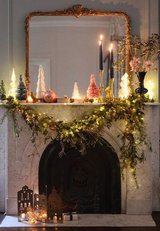 Garland over a decorated mantle.