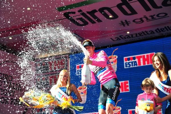 Ryder Hesjedal (Garmin-Barracuda) celebrates on the podium.
