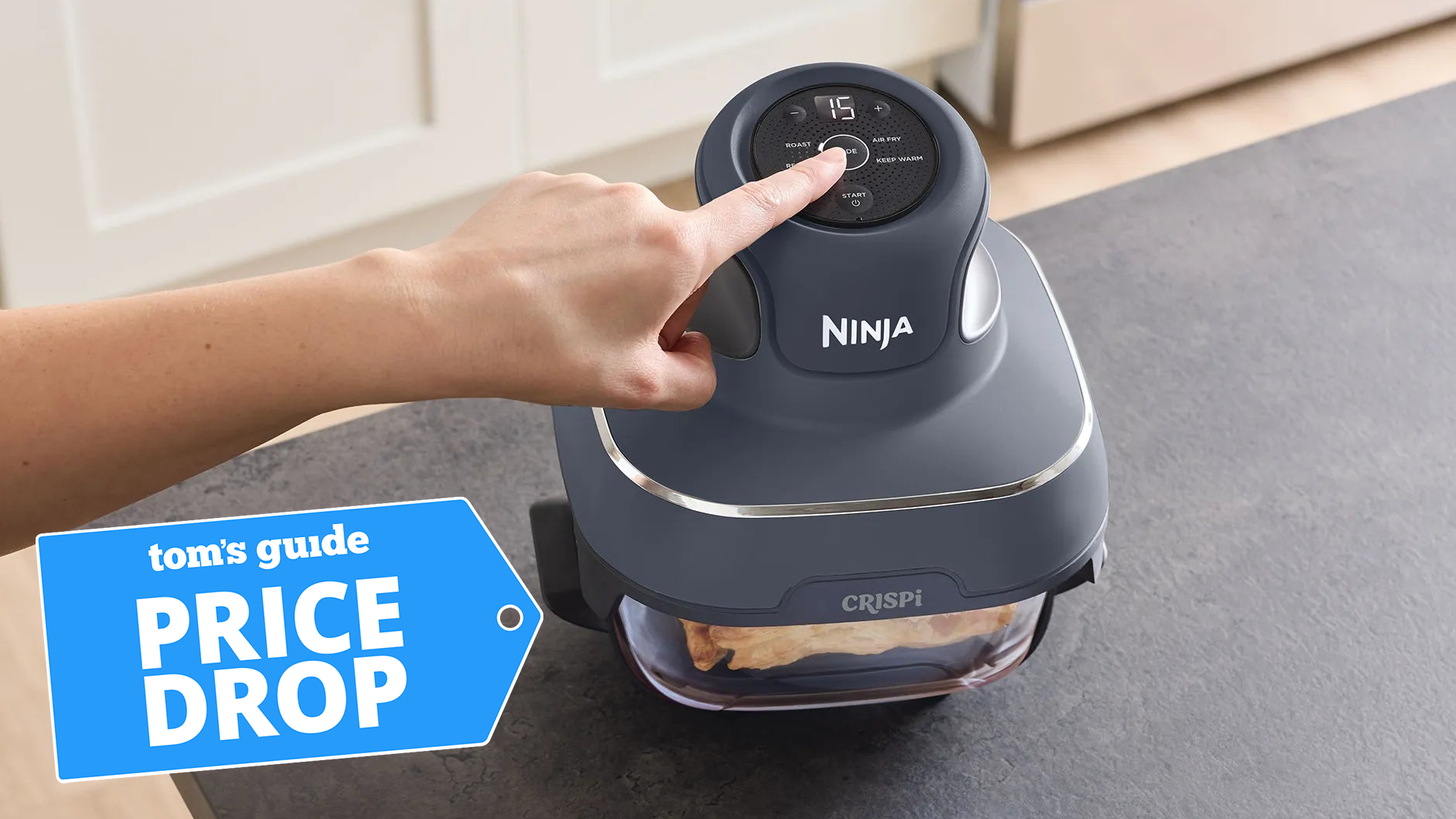 Ninja Crispi on kitchen bench with Tom's Guide deal badge 