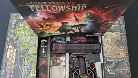 Fate of the Fellowship box seen from above, with a board and box of components below