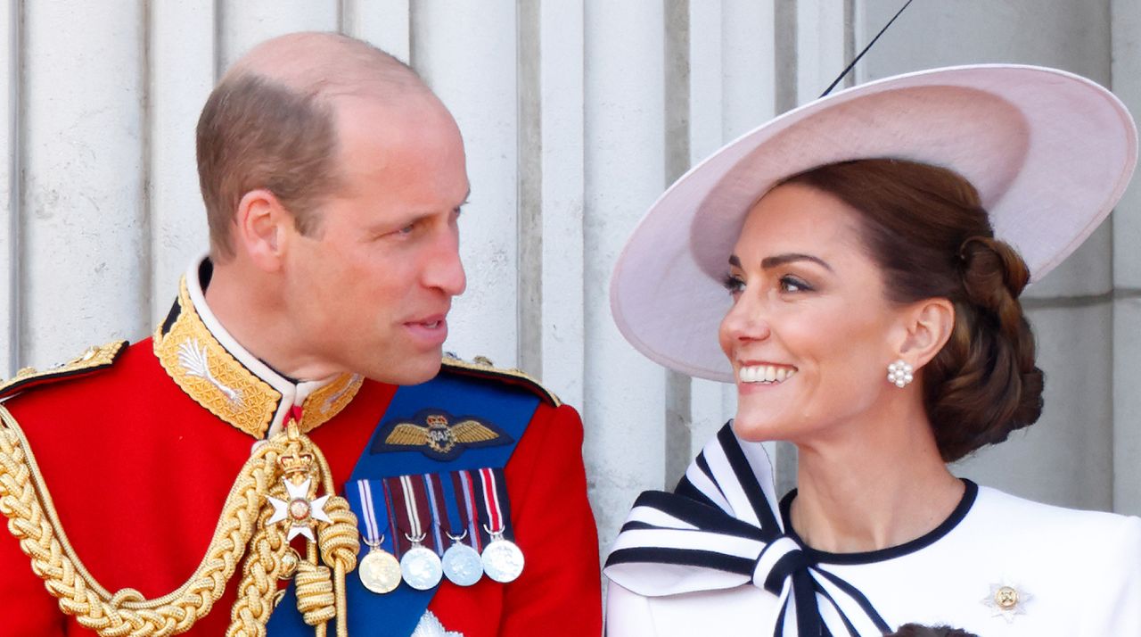 Prince William, Prince of Wales (Colonel of the Welsh Guards) and Catherine, Princess of Wales watch an RAF flypast from the balcony of Buckingham Palace after attending Trooping the Colour on June 15, 2024 in London, England. 