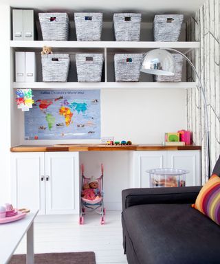 kids room with baskets on shelves and toys