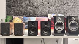 Speakers in a row on a desktop